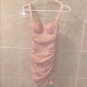 Animal Instinct Leopard Print Ruched Mini Dress.